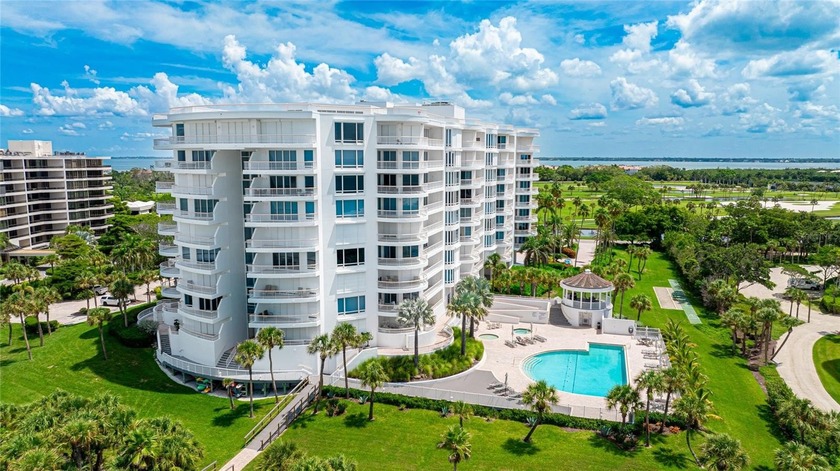 Behind the gates of the renowned Longboat Key Club, this - Beach Condo for sale in Longboat Key, Florida on Beachhouse.com