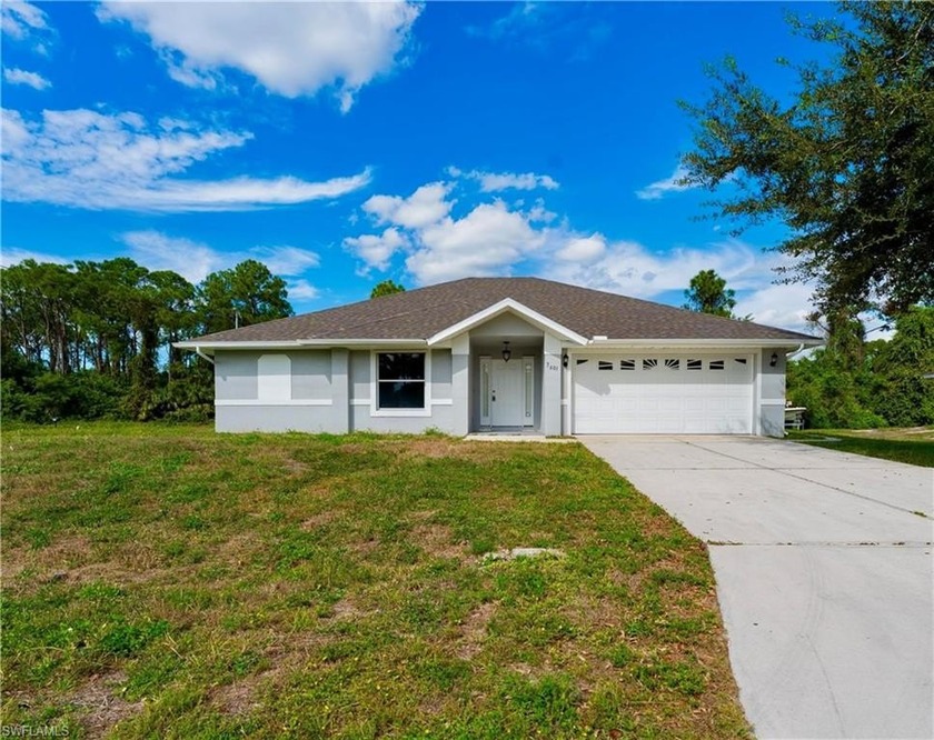 Sitting on a spacious half-acre corner lot, this updated home - Beach Home for sale in Lehigh Acres, Florida on Beachhouse.com