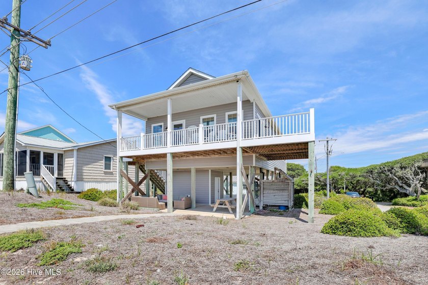 Beach living at its best in this second row( across street from - Beach Home for sale in Surf City, North Carolina on Beachhouse.com