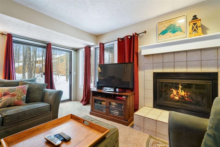 Discover convenient main floor living at Trout Creek #121, a - Beach Condo for sale in Harbor Springs, Michigan on Beachhouse.com
