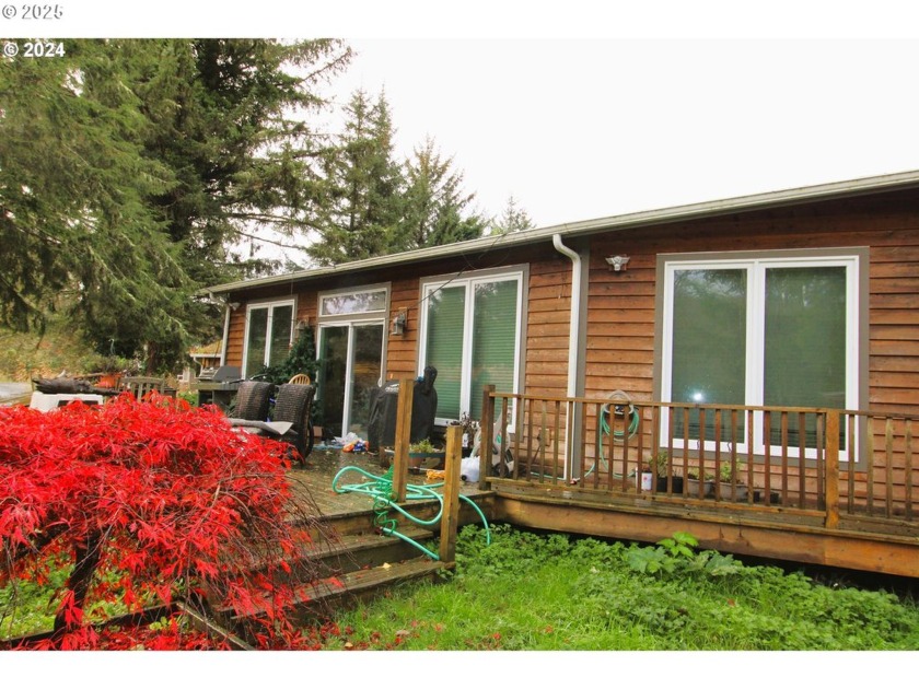 This stunning home offers a bright and expansive kitchen with a - Beach Home for sale in Seaside, Oregon on Beachhouse.com