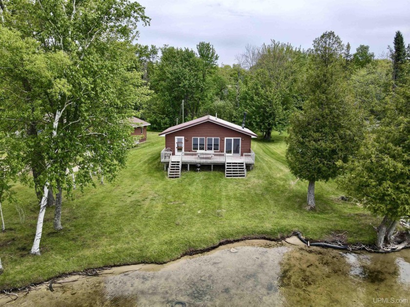 Manilak Resort Condo #17 - Waterfront Opportunity! This - Beach Condo for sale in Mcmillan, Michigan on Beachhouse.com