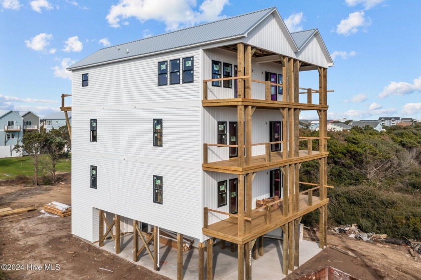 Coastal Elegance Awaits!

Discover your dream beach home just - Beach Townhome/Townhouse for sale in North Topsail Beach, North Carolina on Beachhouse.com