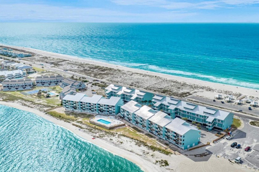 Welcome to 1390 Ft. Pickens Road, a beautifully updated two - Beach Condo for sale in Pensacola Beach, Florida on Beachhouse.com