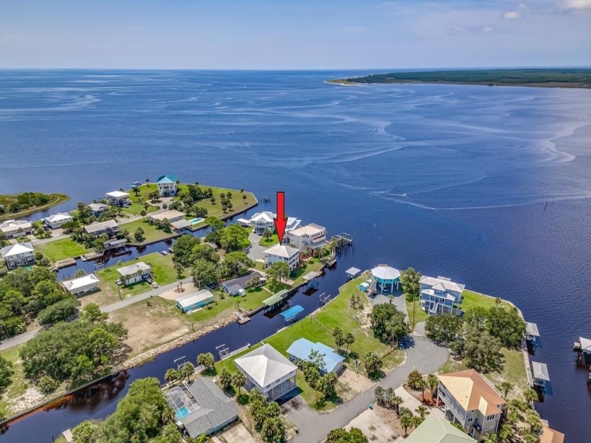 **Spectacular Four-Bedroom Waterfront Home**  Discover this - Beach Home for sale in Panacea, Florida on Beachhouse.com