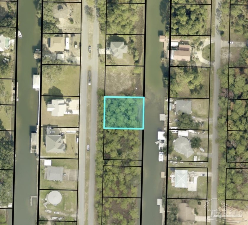 Wooded canal-front lot located in the Monterey Shores - Beach Lot for sale in Milton, Florida on Beachhouse.com