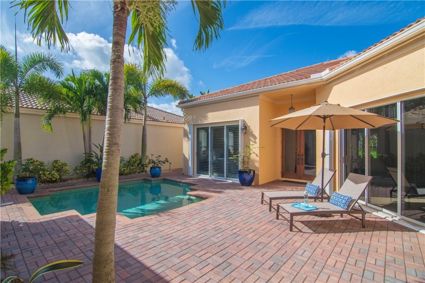 Welcome to this stunning lakefront tropical oasis courtyard home - Beach Home for sale in Vero Beach, Florida on Beachhouse.com