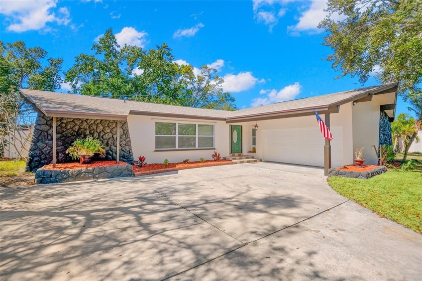 Absolutely Gorgeous & Fully Renovated 4-Bedroom Home! Prepare to - Beach Home for sale in Largo, Florida on Beachhouse.com