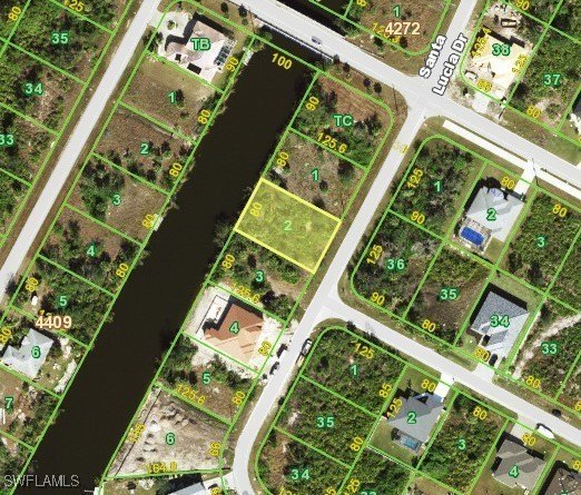 Canal Front, city water and city sewer.  Experience - Beach Lot for sale in Port Charlotte, Florida on Beachhouse.com