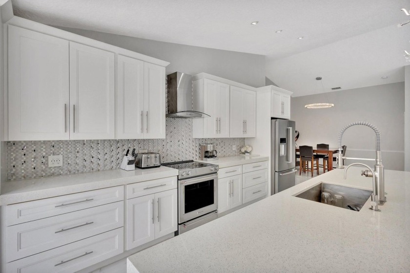 Welcome to this meticulously renovated 1 story single family - Beach Home for sale in Palm Beach Gardens, Florida on Beachhouse.com