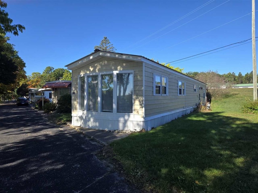 Nicely remodeled 2 bedroom 1 bath home with appliances including - Beach Home for sale in Charlevoix, Michigan on Beachhouse.com