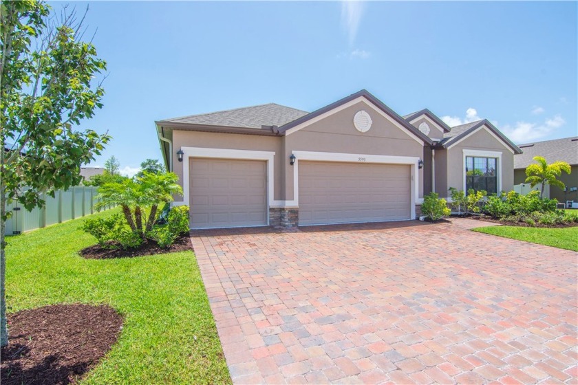 Popular DR Horton Redbud floor plan, features triple split - Beach Home for sale in Vero Beach, Florida on Beachhouse.com