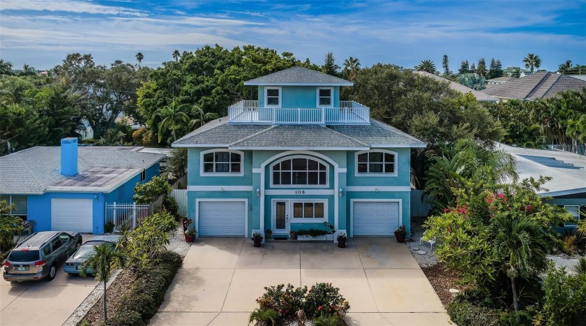 Nestled in the coveted enclave of Belleair Beach, this two-story - Beach Home for sale in Belleair Beach, Florida on Beachhouse.com