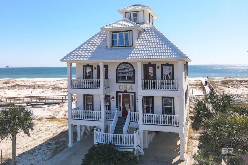Nestled within a gated community, this stately GULF FRONT home - Beach Home for sale in Gulf Shores, Alabama on Beachhouse.com