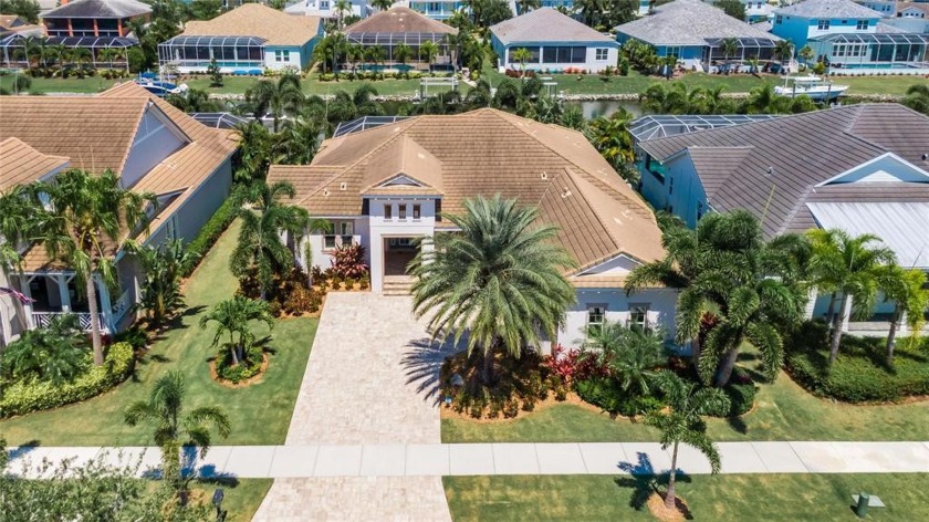 Gorgeous Palms welcome you to this elegant MIRABAY Waterfront - Beach Home for sale in Apollo Beach, Florida on Beachhouse.com
