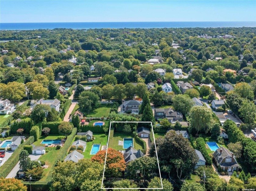 Step into elegance and effortless living in this meticulously - Beach Townhome/Townhouse for sale in Southampton, New York on Beachhouse.com