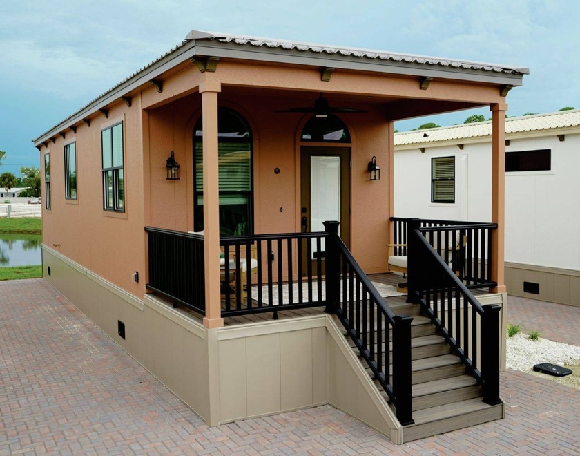 This NEW 2025 1 Bedroom, 1.5 Bath Resort Cottage Home features a - Beach Home for sale in North Port, Florida on Beachhouse.com