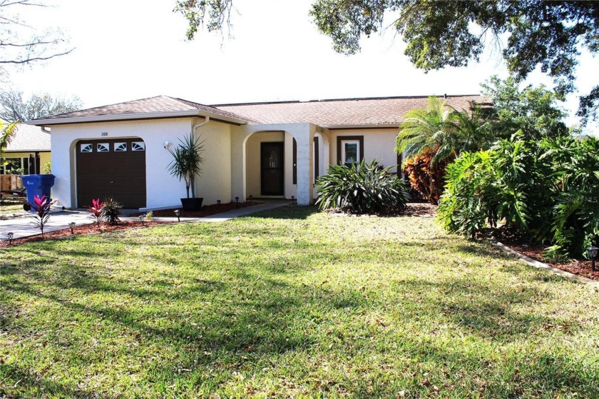 Discover this meticulously maintained and beautifully updated - Beach Home for sale in Palm Harbor, Florida on Beachhouse.com