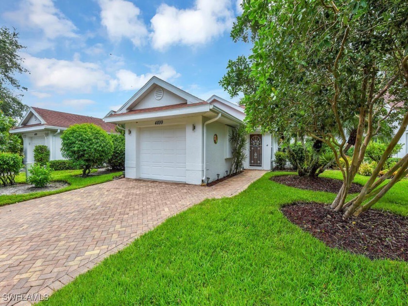 Charming 3-Bedroom Villa with Lakeview in World Tennis Center - Beach Home for sale in Naples, Florida on Beachhouse.com