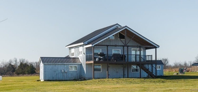 Step into the perfect blend of rustic charm and modern comfort - Beach Home for sale in Lyme, New York on Beachhouse.com