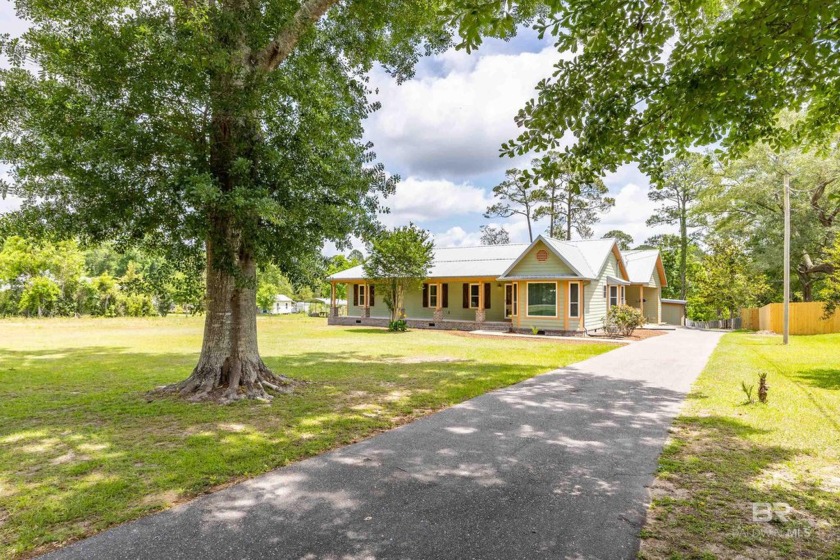 BEST PRICED HOME ON DEEP WATER - Enjoy this stunning waterfront - Beach Home for sale in Foley, Alabama on Beachhouse.com