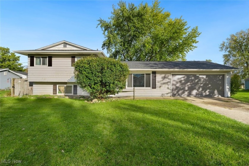 Welcome home to this surprising 4 bedrooms split level in - Beach Home for sale in Sheffield Lake, Ohio on Beachhouse.com