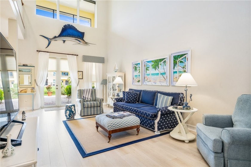 Indulge in the coastal ambiance of this lakefront home. Step - Beach Home for sale in Vero Beach, Florida on Beachhouse.com