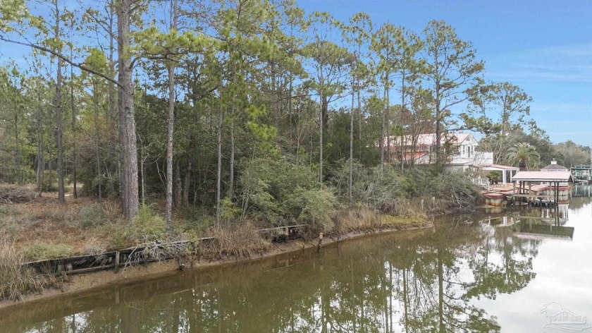 Canal front lot with 101 ft on the canal. Canal leads to Bay - Beach Lot for sale in Milton, Florida on Beachhouse.com