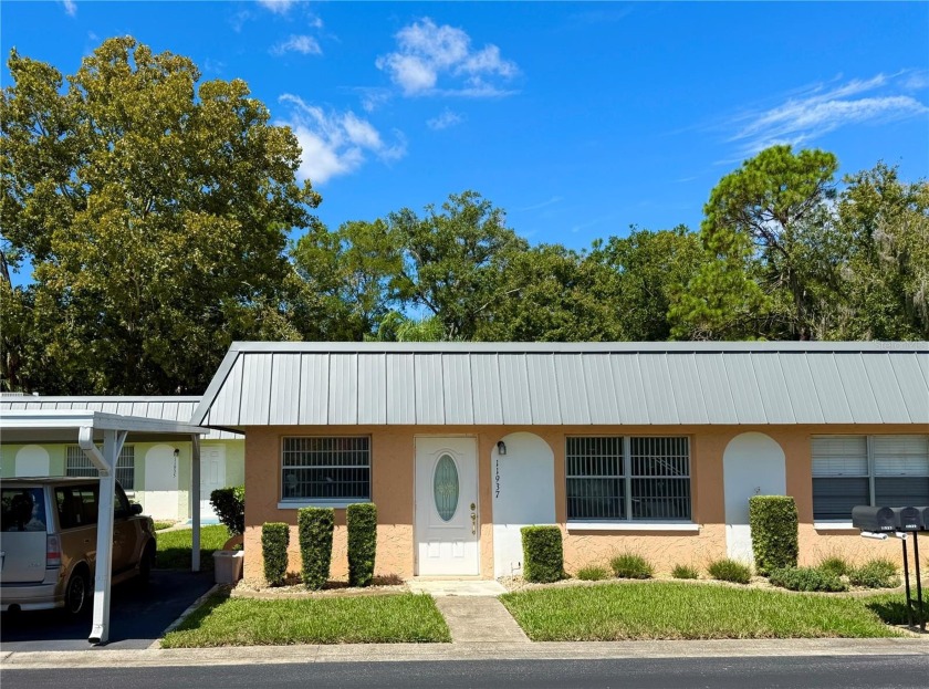 Enjoy resort style living at Pointe West in Summertree. This - Beach Condo for sale in New Port Richey, Florida on Beachhouse.com