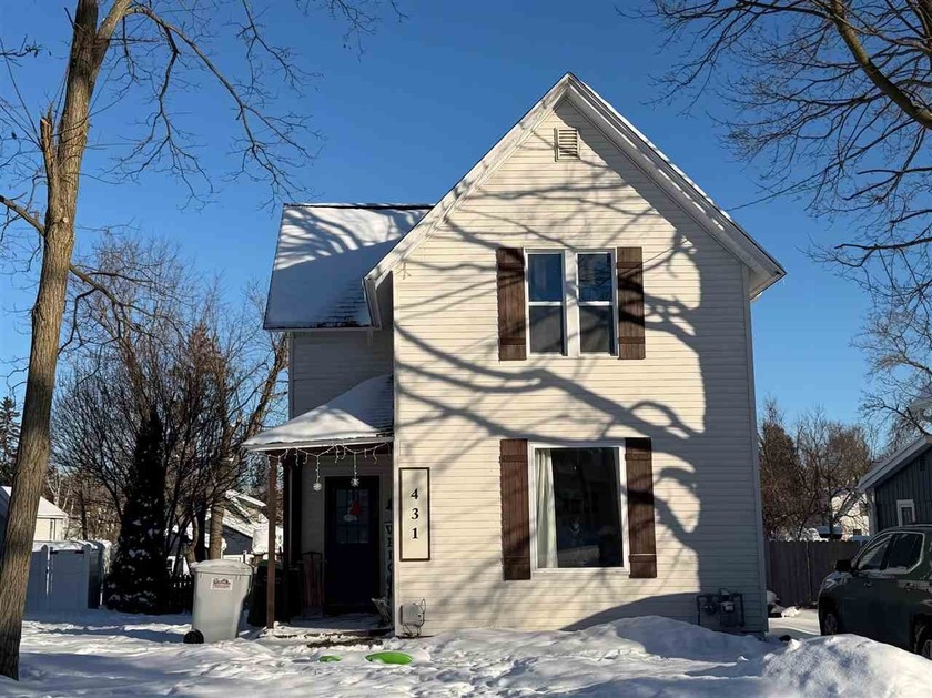 Charming 3-bedroom, 1-bath in-town home just a short walk to - Beach Home for sale in Petoskey, Michigan on Beachhouse.com