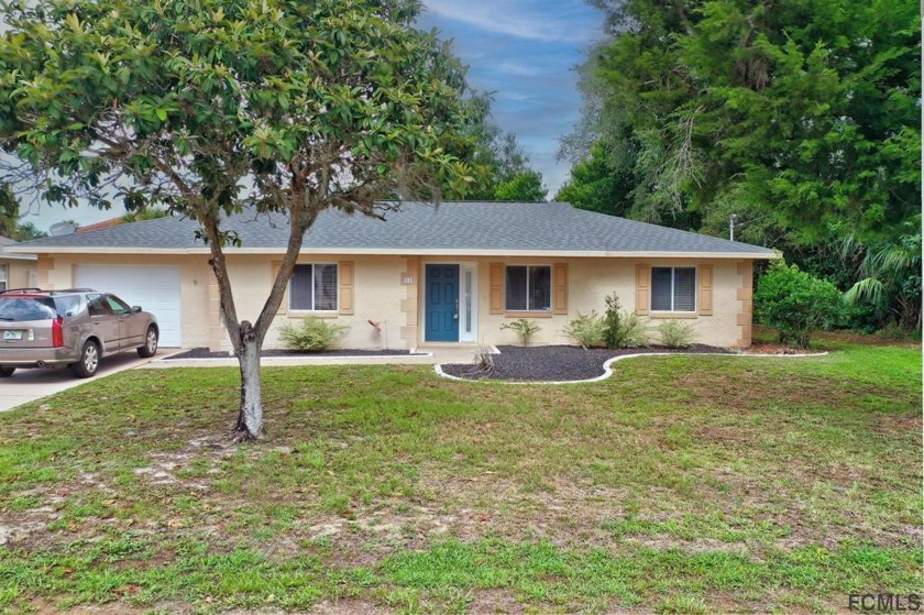 Super cute fully fenced home in excellent condition, centrally - Beach Home for sale in Palm Coast, Florida on Beachhouse.com