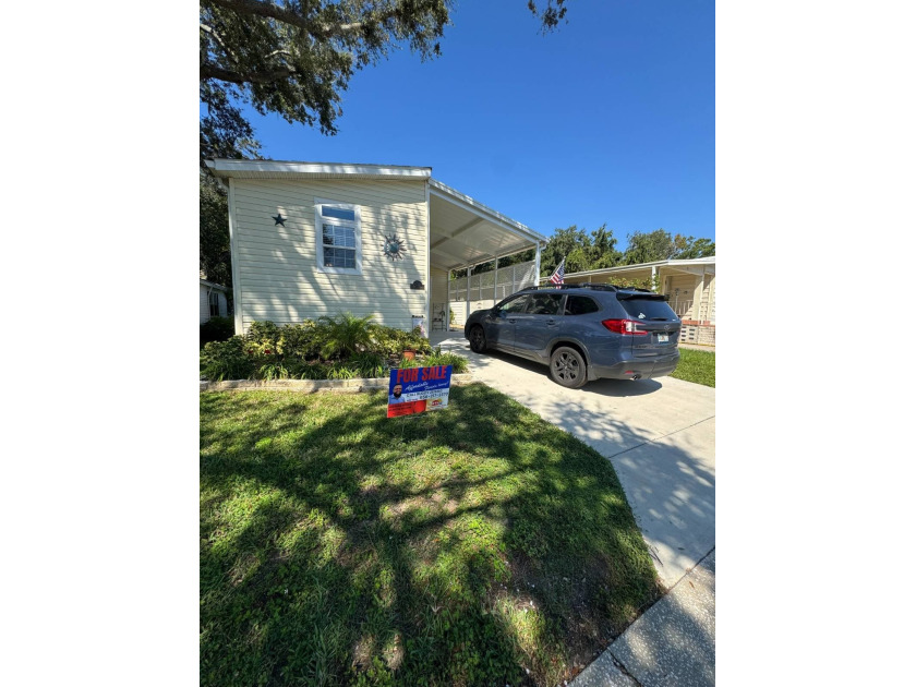 Welcome to Lakeshore Villas, one of Tampa's premier 55+ - Beach Home for sale in Tampa, Florida on Beachhouse.com