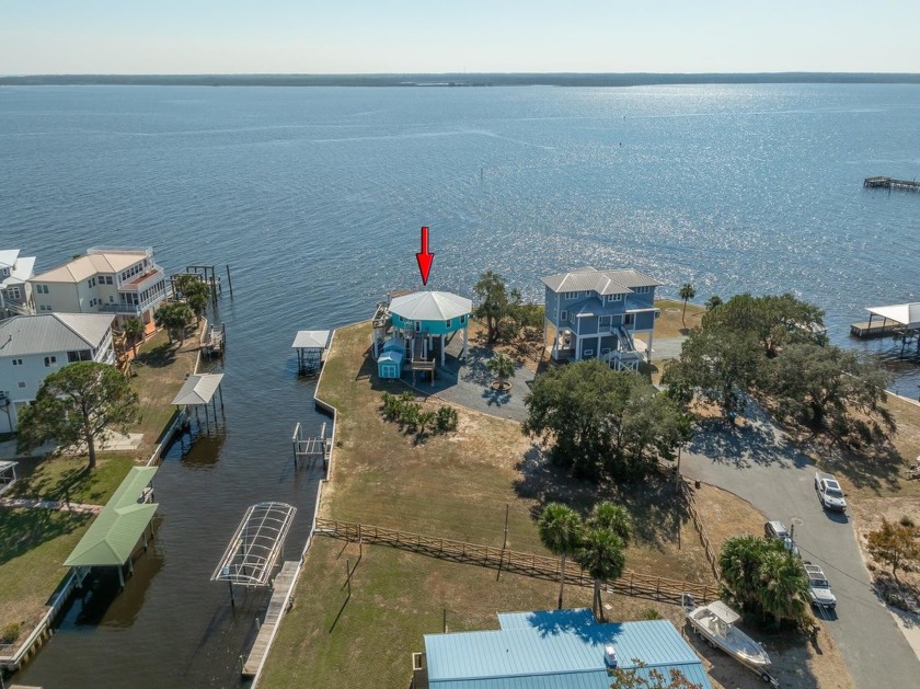 This waterfront home is located at the end of a canal with an - Beach Home for sale in Ochlockonee Bay, Florida on Beachhouse.com