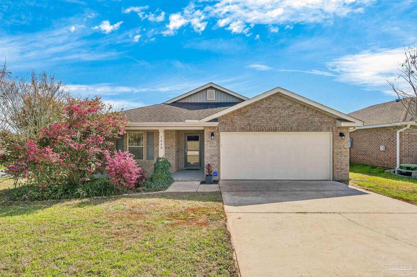 Located on a corner lot in Bon View, this all-brick home offers - Beach Home for sale in Milton, Florida on Beachhouse.com