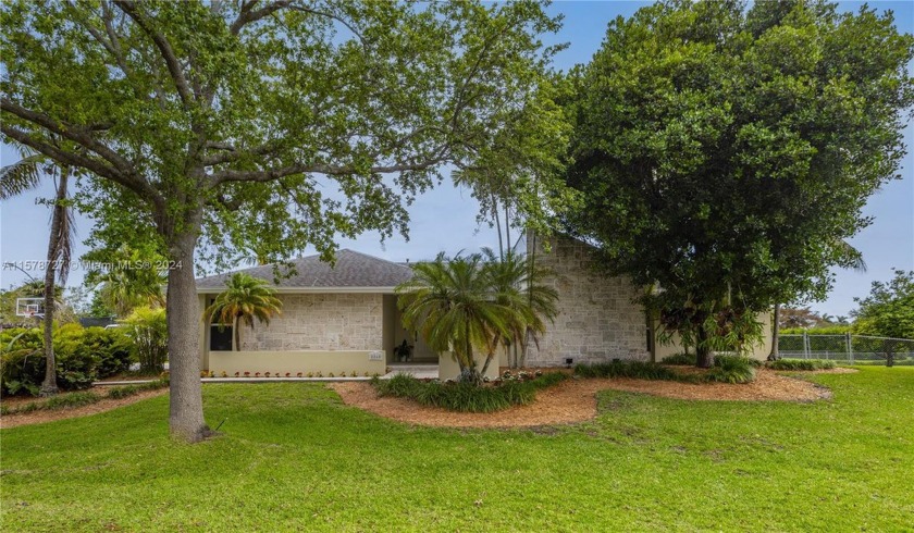 Discover luxurious living in this fully renovated 4-bedroom - Beach Home for sale in Palmetto Bay, Florida on Beachhouse.com