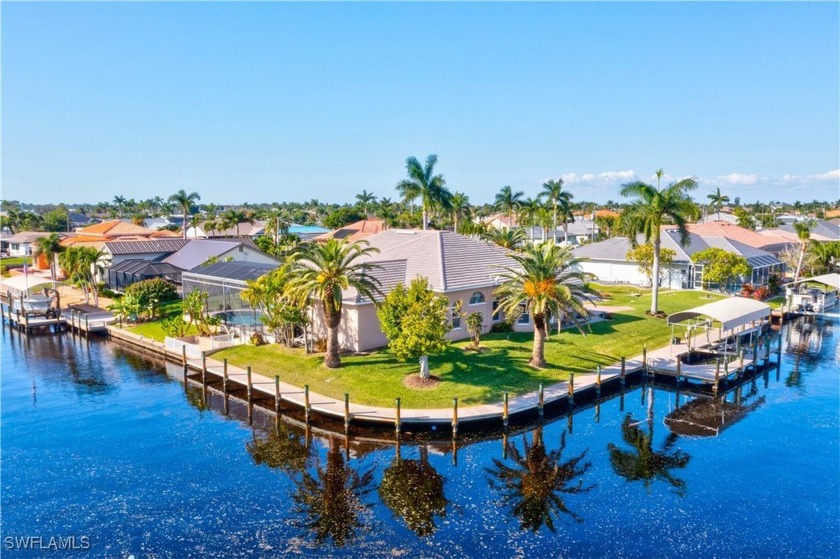 Welcome to your waterfront paradise! This stunning Cape Coral - Beach Home for sale in Cape Coral, Florida on Beachhouse.com