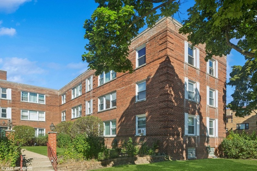 Welcome home to this desirable second floor corner unit drenched - Beach Home for sale in Chicago, Illinois on Beachhouse.com