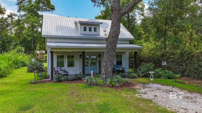 Just steps from beautiful Perdido Bay, This stunning 2021 custom - Beach Home for sale in Lillian, Alabama on Beachhouse.com