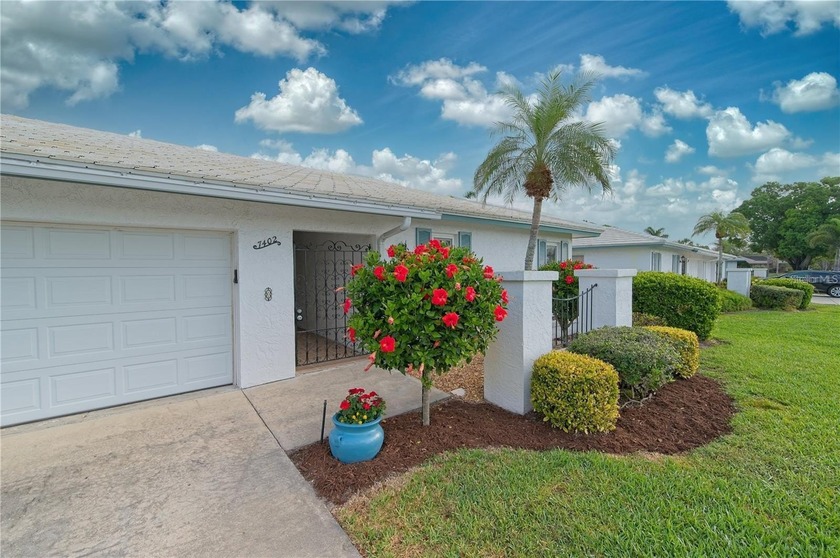 Welcome to this vibrant Village Green villa- 2BR/2BA PLUS DEN - Beach Condo for sale in Bradenton, Florida on Beachhouse.com