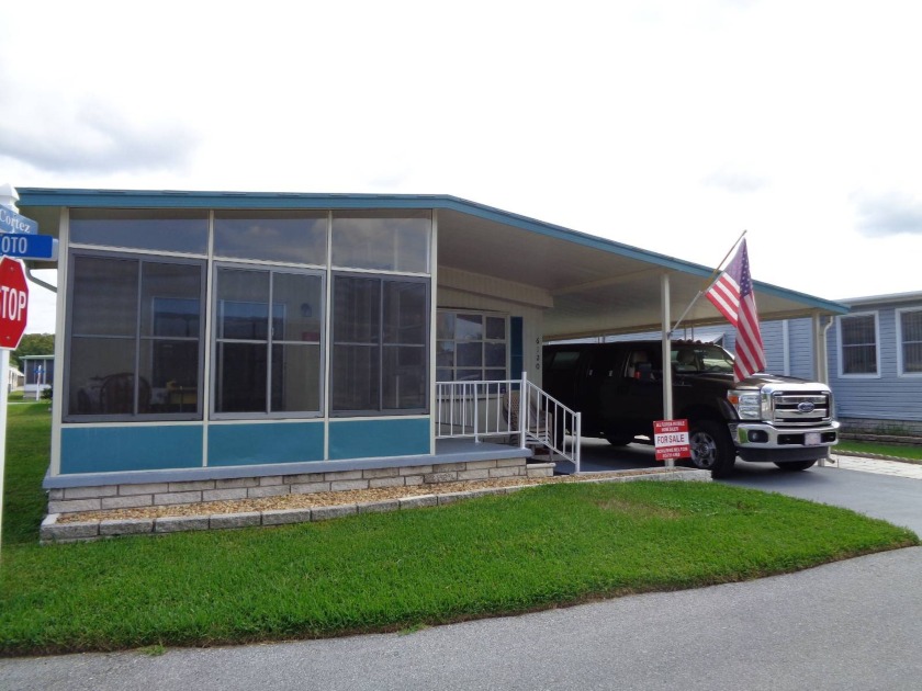 WOULD YOU LOVE TO WALK OUT YOUR DOOR, ACROSS THE ROAD, AND GO TO - Beach Home for sale in New Port Richey, Florida on Beachhouse.com