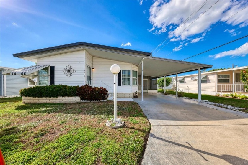 Charming 2-Bedroom, 2-Bath Mobile Home in Gulf Lake Residence - Beach Home for sale in Bradenton, Florida on Beachhouse.com