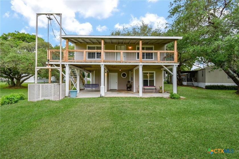 Enjoy coastal living at 1551 Bayview Dr in the gated community - Beach Home for sale in Palacios, Texas on Beachhouse.com