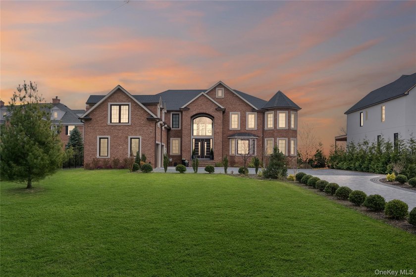 Welcome home to this young, expansive Waterfront Colonial - Beach Home for sale in West Islip, New York on Beachhouse.com