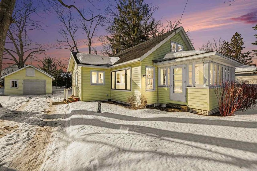 Charm, character, and a quaint 1 1/2-story home have much - Beach Home for sale in Harbor Springs, Michigan on Beachhouse.com