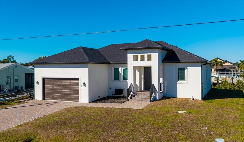 Florida waterfront living at its finest in this 2023 - Beach Home for sale in Port Charlotte, Florida on Beachhouse.com