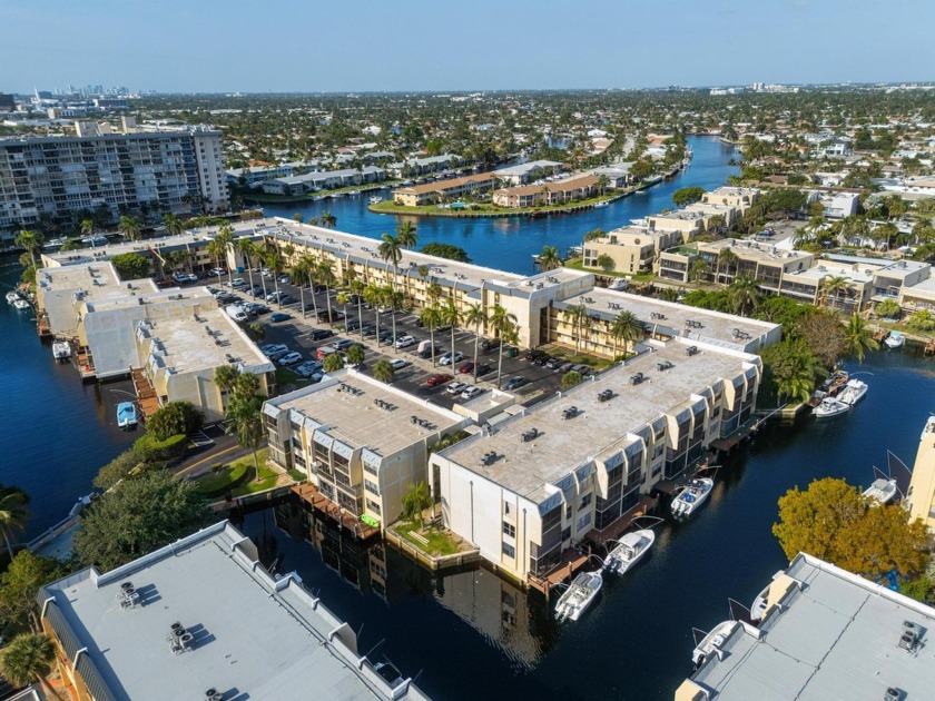 Waterfront living with a deeded dock!  This stunning 2 bed/2 - Beach Condo for sale in Pompano Beach, Florida on Beachhouse.com