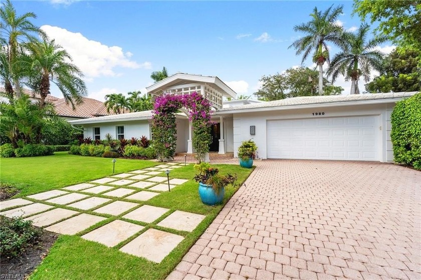 Just steps from the sugar-white sands of Naples Beach, this - Beach Home for sale in Naples, Florida on Beachhouse.com