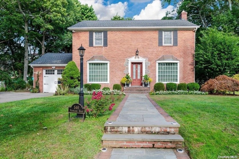 This classic All-Brick Center Hall Colonial is situated in the - Beach Home for sale in Brightwaters, New York on Beachhouse.com