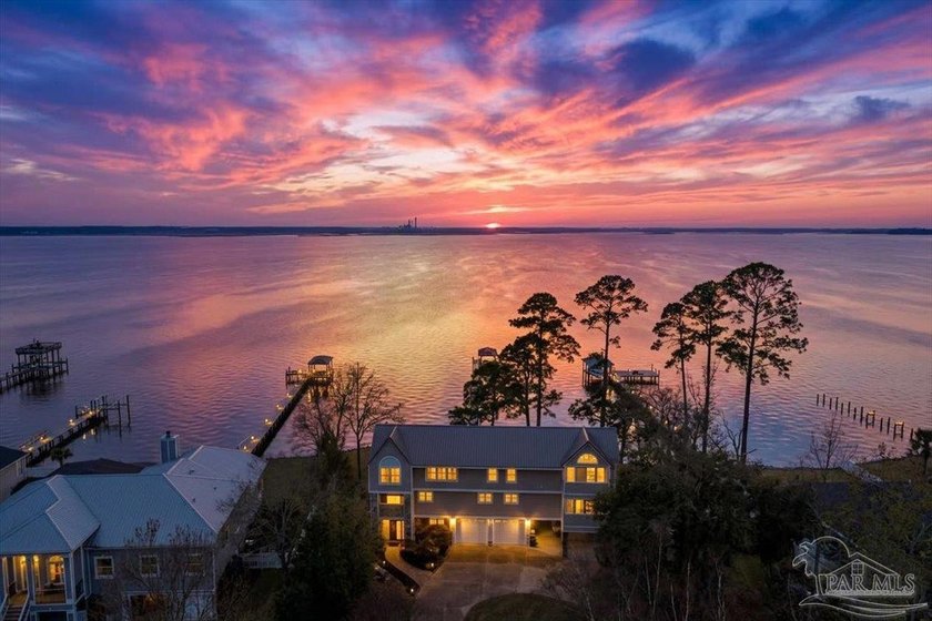 Experience breathtaking waterfront living on Escambia Bay at - Beach Home for sale in Milton, Florida on Beachhouse.com
