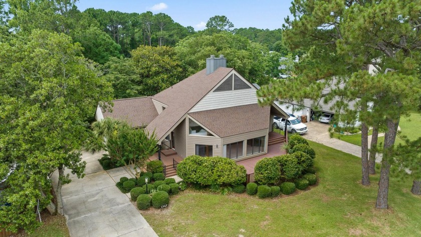 Nestled in the sought-after Whisper Bay subdivision, this - Beach Home for sale in Gulf Breeze, Florida on Beachhouse.com